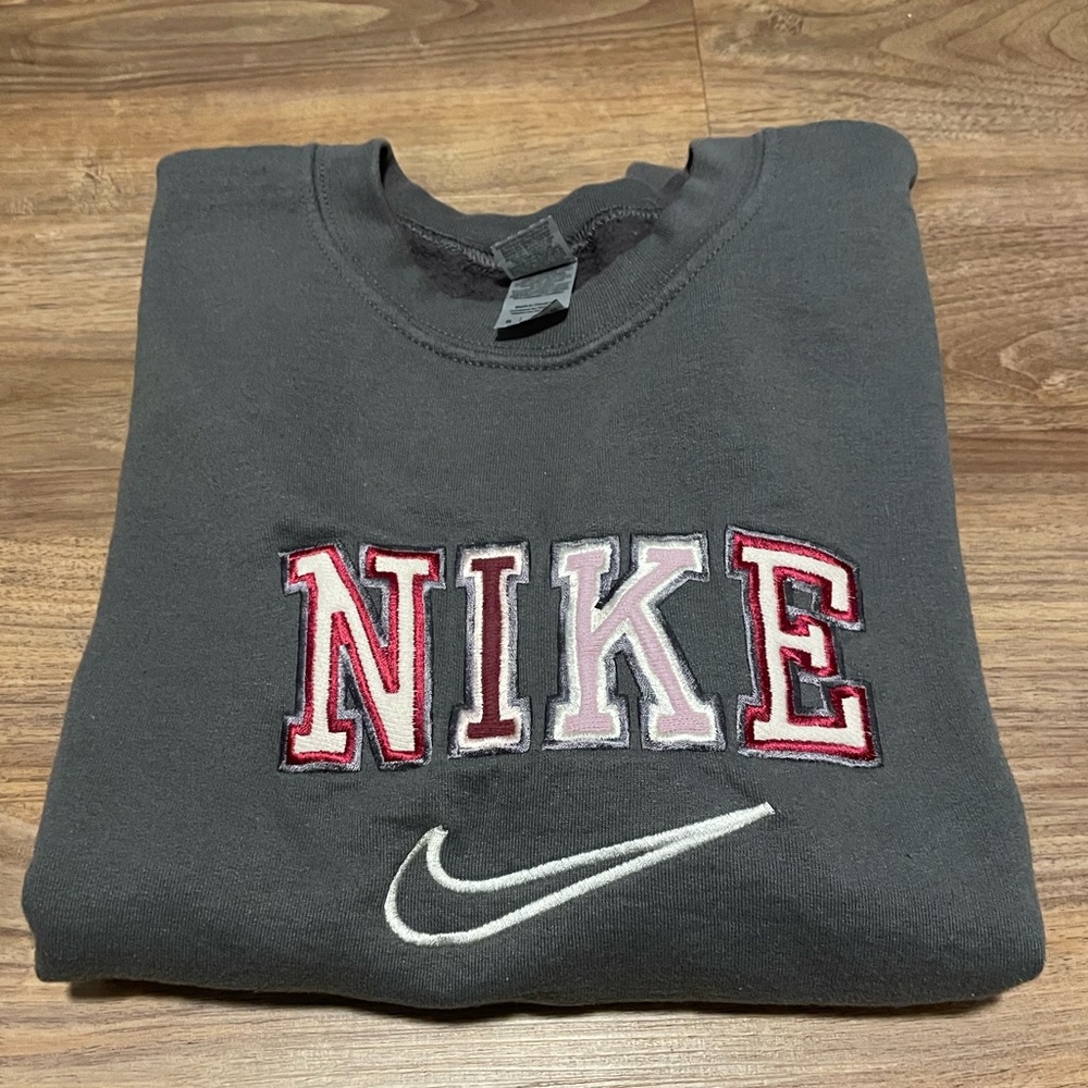 Grey Nike sweatshirt